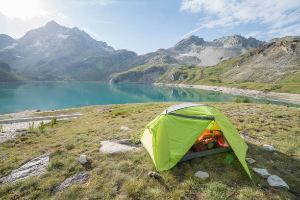 istock Campsite settled by a mountain lake 844031288