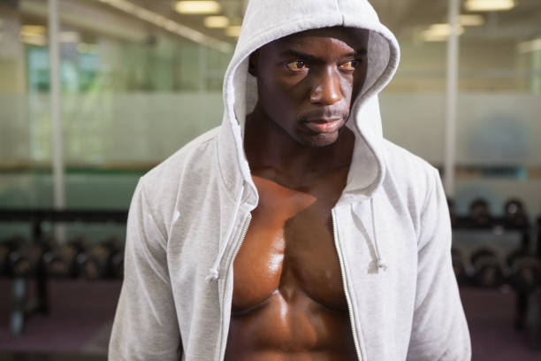 istock Muscular man in hood jacket 844031434