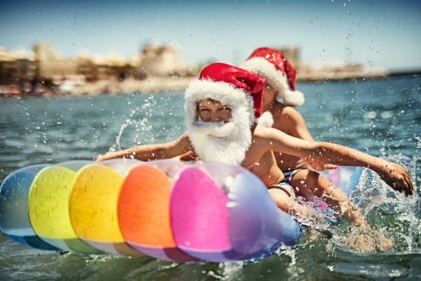 istock Kids splashing on air bed during summer Christmas 844034728