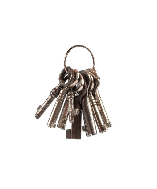 Bunch of keys on a wooden board background 3D rendering
