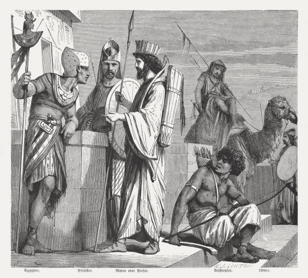 Ancient peoples: Egyptian, Philistine, Persian, Ethiopian, Libyan, published in 1886 Members of different ancient peoples: Egyptian, Philistine, Persian, Ethiopian, Libyan (from left). Wood engraving, published in 1886. libyan culture stock illustrations