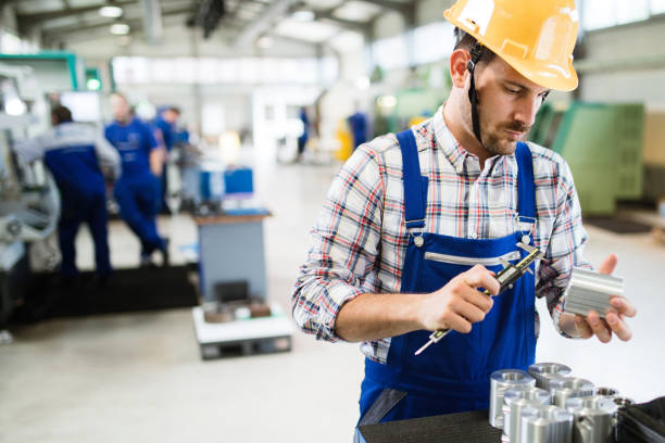 istock Male worker and quality control inspection in factory 844047198