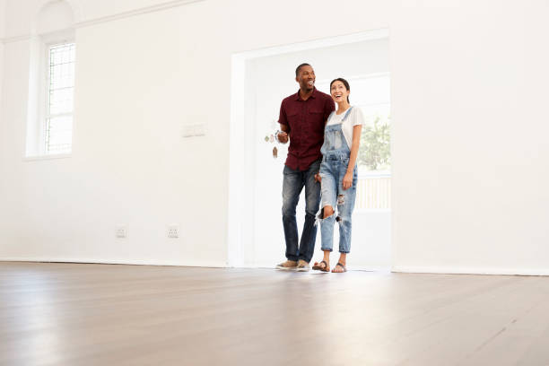 istock Excited Young Couple Moving Into New Home Together 844054214