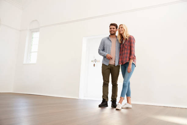 istock Excited Young Couple Moving Into New Home Together 844055410
