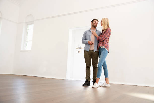 istock Excited Young Couple Moving Into New Home Together 844055634