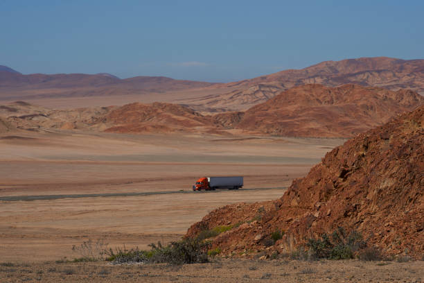 Vehicles travelling on the Pan American Highway in the Atacama Desert of northern Chile.