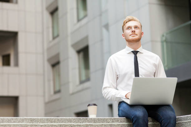 istock Young adult businessman working outsourcing and wondering . 844058828