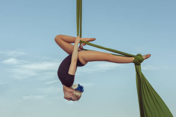 istock Woman air gymnast performs a trick. 844058860