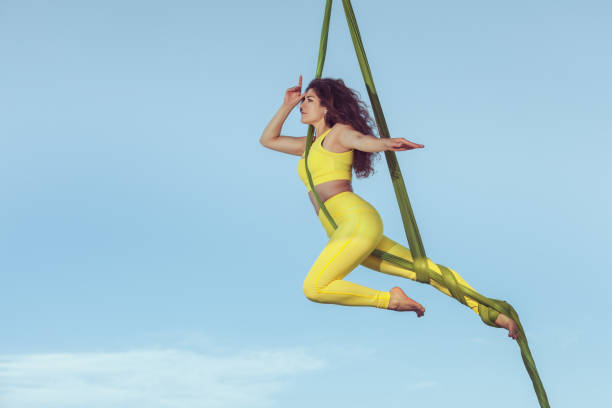 istock Woman the equilibrist highly in the sky. 844060976