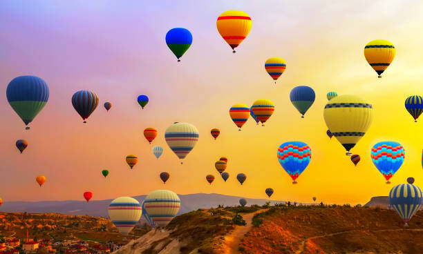 hot air ballons flight Tourists ride hot air ballons flight Balloon Festival panorama ballooning festival stock pictures, royalty-free photos & images
