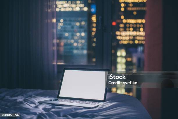 Always Online Stock Photo - Download Image Now - Laptop, Night, Bed - Furniture