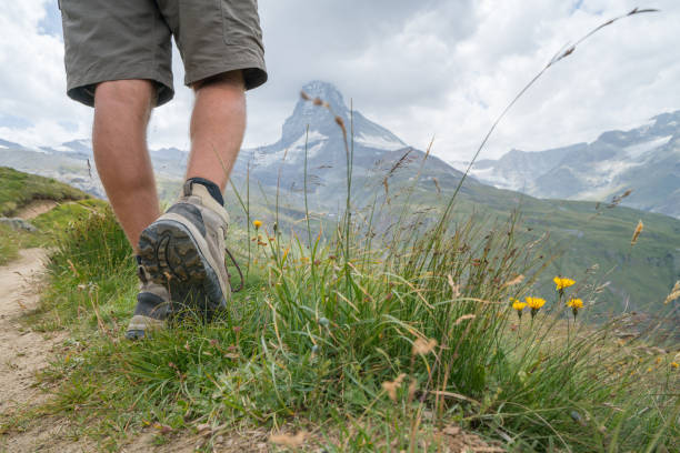 istock Low section of hiker in Zermatt, view on Matterhorn 844081012
