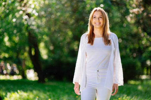 istock Beautiful brunette in nature 844085280