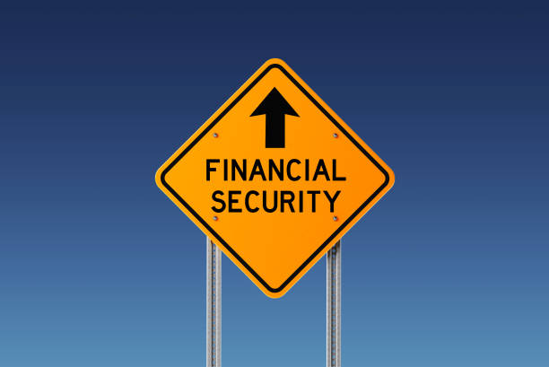 istock Yellow Financial Security Ahead Traffic Sign on Blue Sky 844088086