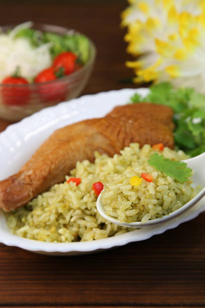 Arroz con pollo is a dish popular in South and Central America, and is also known as chicken rice.