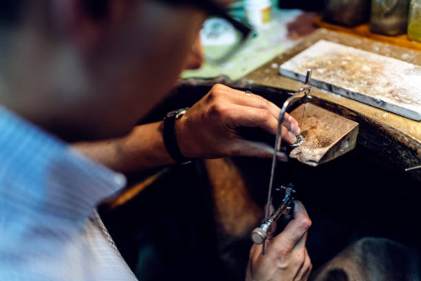 istock Jeweler making jewelry 844094960