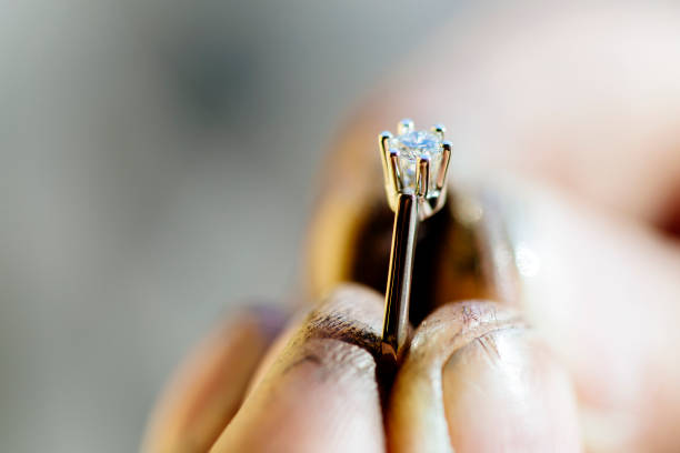 istock Ring held by jeweler after polishing 844095096