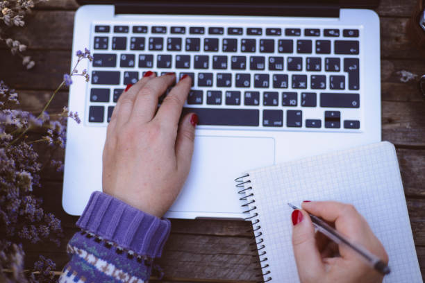 istock Woman working at home office hand on keyboard close up 844095210