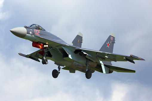 Kubinka, Moscow Region, Russia - June 9, 2015: Sukhoi SU-35S RF-95243 modern superconic jet fighter of russian air force landing at Kubinka air force base during Army-2015 forum