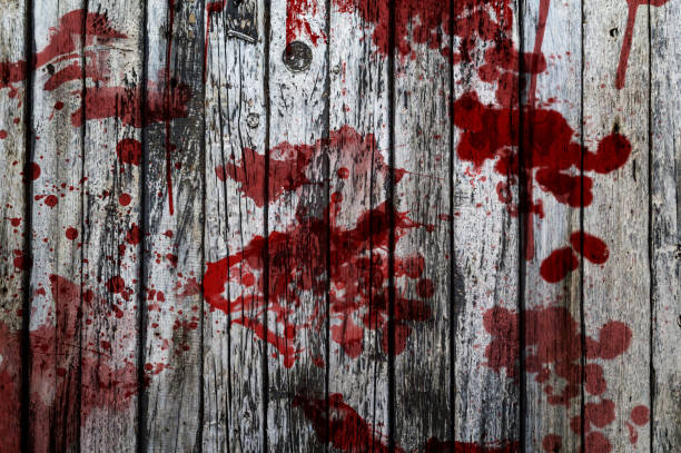 Blood on a wooden background. Concept of crime scene.