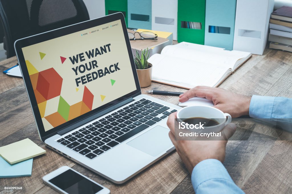 WE WANT YOUR FEEDBACK CONCEPT Testimonial Stock Photo