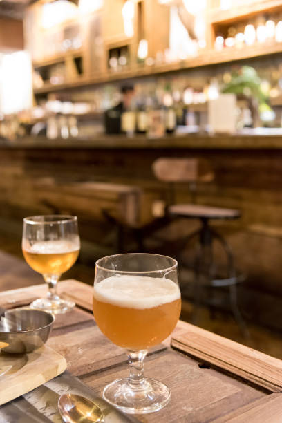 istock Drinking beer in the pub and restaurant cafe with blur bar background at night. 844100004