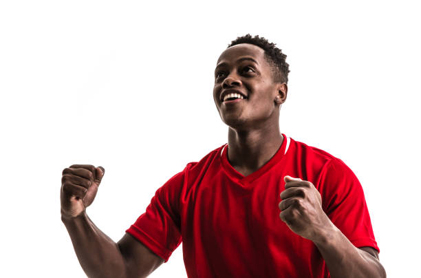 istock Fan / Sport Player on red uniform celebrating on white background 844103086