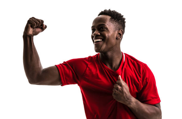 istock Fan / Sport Player on red uniform celebrating on white background 844103098