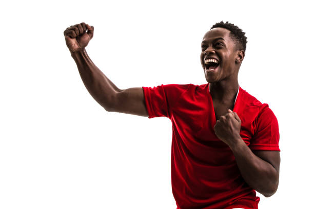 Fan / Sport Player on red uniform celebrating on white background Sport collection kenyan man stock pictures, royalty-free photos & images