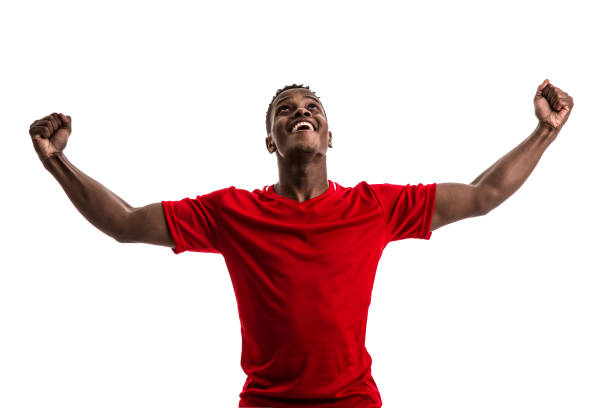 istock Fan / Sport Player on red uniform celebrating on white background 844103138