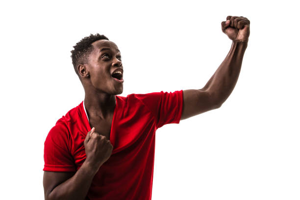 istock Fan / Sport Player on red uniform celebrating on white background 844103140