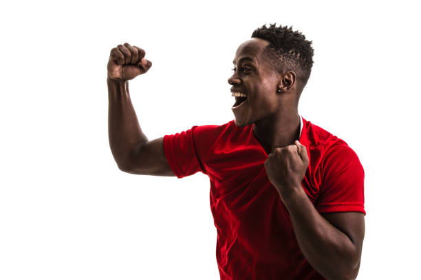 istock Fan / Sport Player on red uniform celebrating on white background 844103142