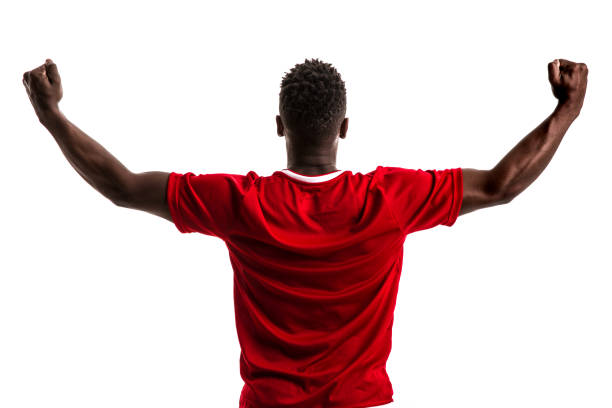 istock Fan / Sport Player on red uniform celebrating on white background 844103150