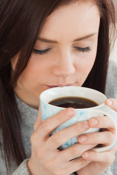 istock Content girl drinking a cup of coffee 844103450