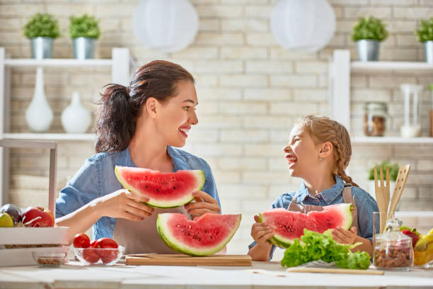 istock Happy family in the kitchen. 844103656