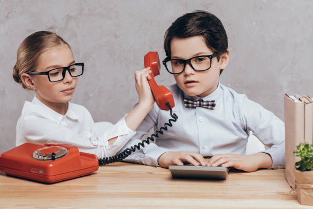 istock children wit telephone and calculator 844106894