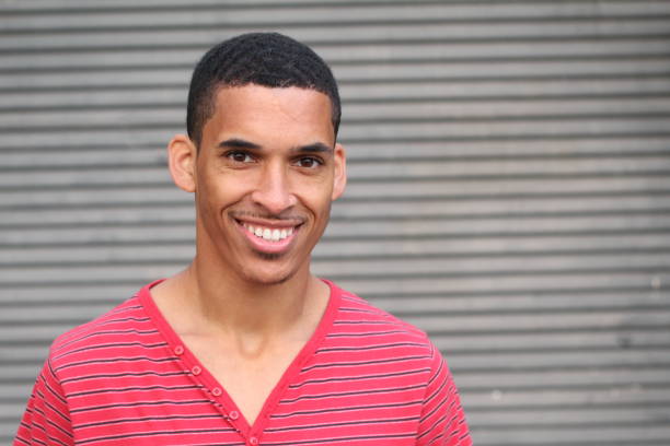 istock Close-up of smiling young dark-skinned man 844107558