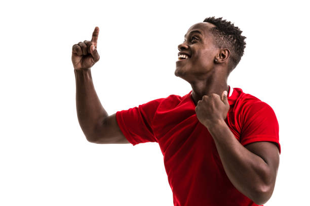 istock Fan / Sport Player on red uniform celebrating on white background 844110074
