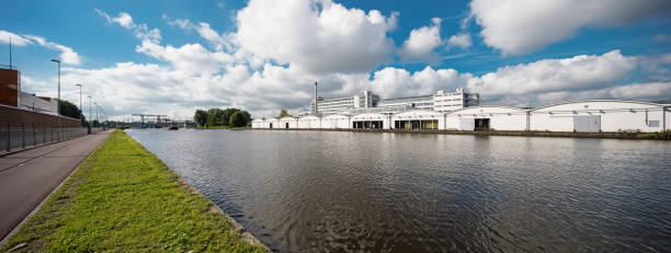 istock Dutch industrial landscape on the river 844110424