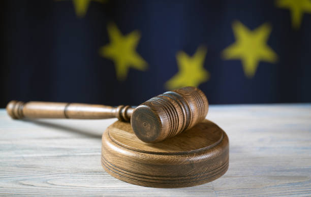 istock Law and Justice symbols. EU flag background. 844110756