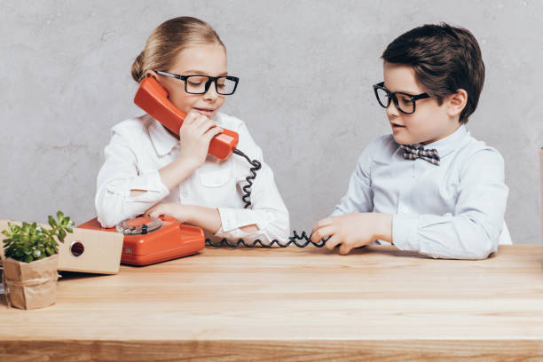 istock little girl talking on telephone 844111188