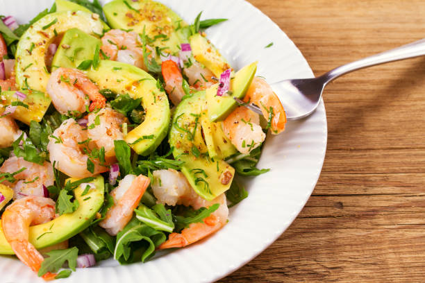 istock Shrimp salad with avocado and arugula 844117184