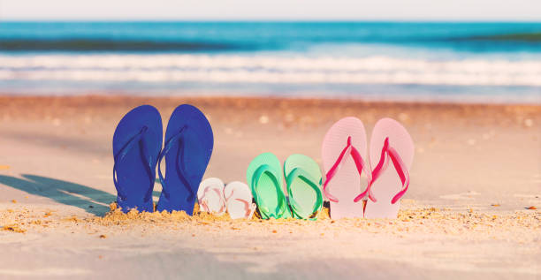 istock Colorful sandals at the beach 844121568