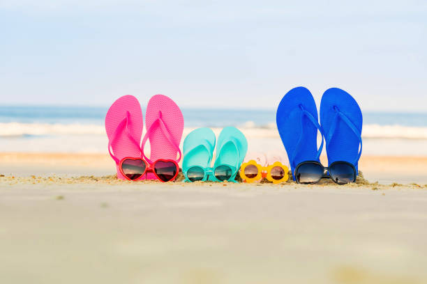 istock Colorful sandals at the beach 844121828