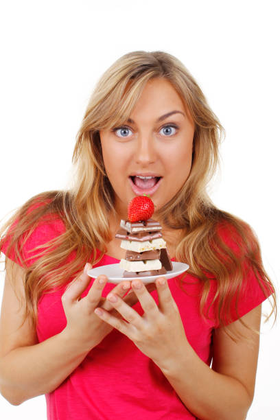 istock woman with sweet pastry and chocolate 844124926