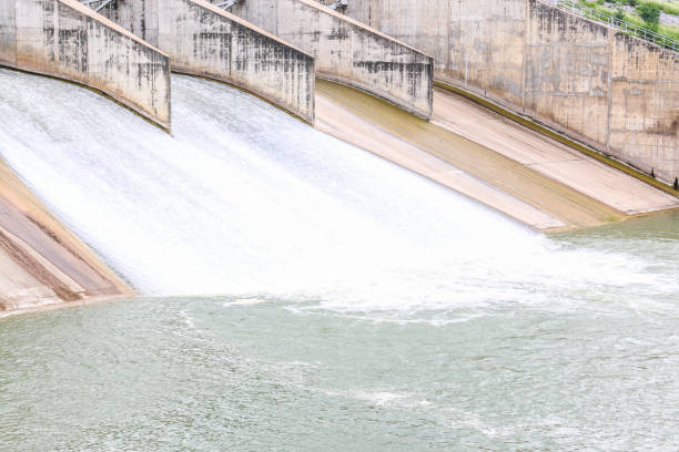 istock water is coming from concrete dam 844130014
