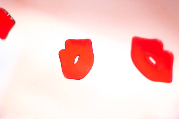 istock Red lips shapes female lipstick makeup abstract multiple image artistic creation 844132960