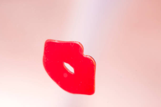 istock Red lips shapes female lipstick makeup abstract multiple image artistic creation 844132976