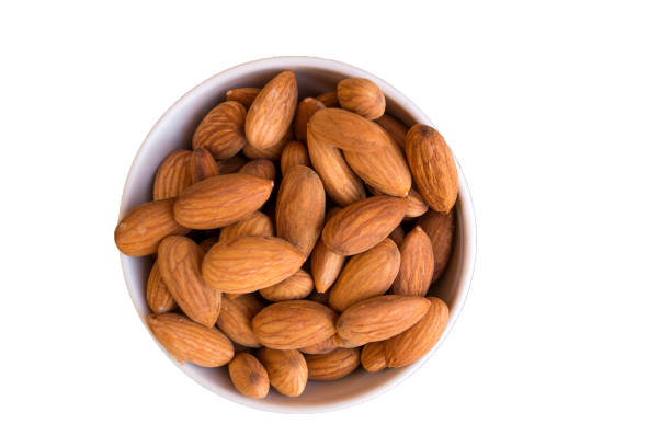 istock White ceramic bowl with almond isolated on white background 844140710