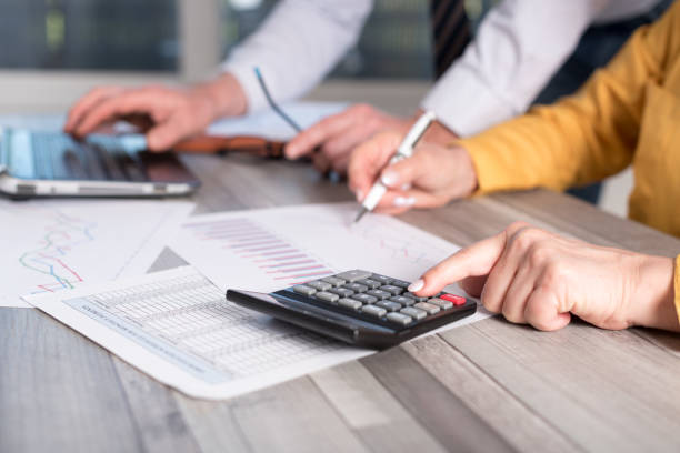 istock Two business people working together 844148402